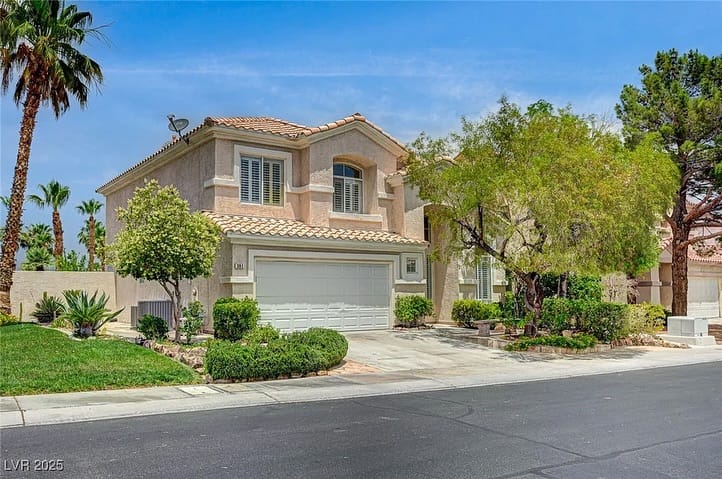 Two-story home with palm trees, sold by Park Place Realty, Las Vegas