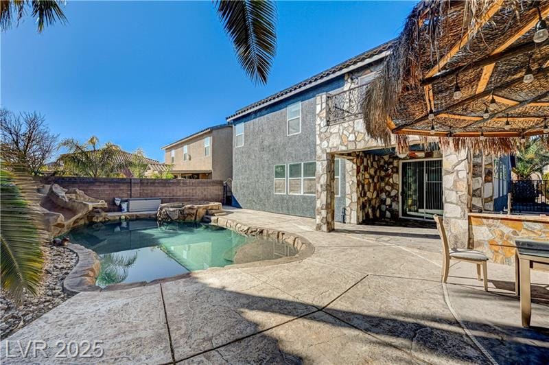 Single-story home with pool and desert landscaping in Summerlin