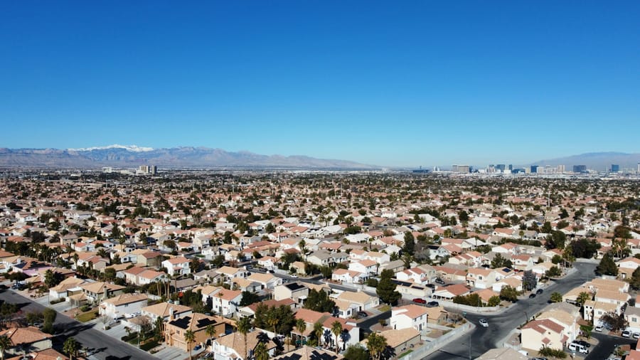 Aerial view of Spring Valley homes with the Spring Mountains in the background