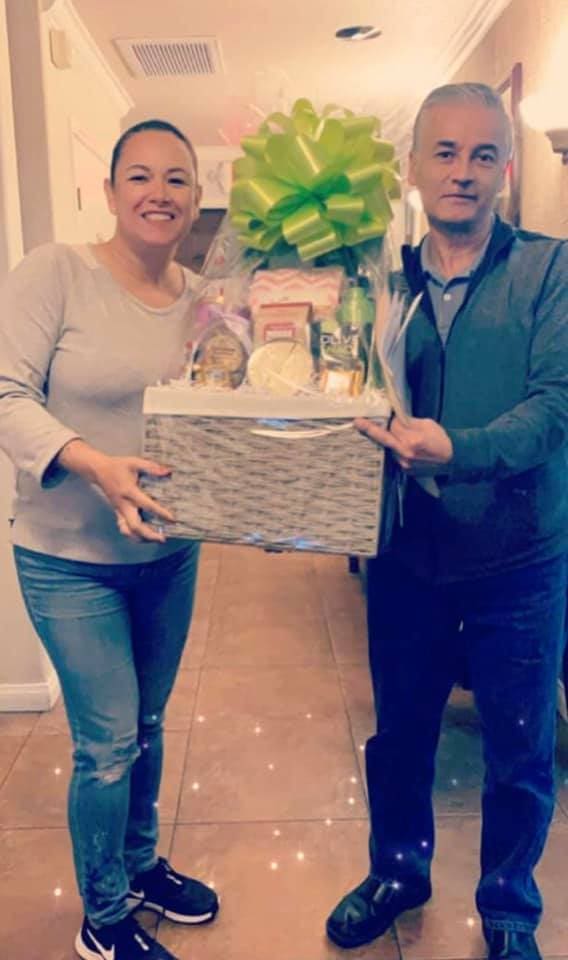 A Park Place Realty closing gift basket changing hands in 2020